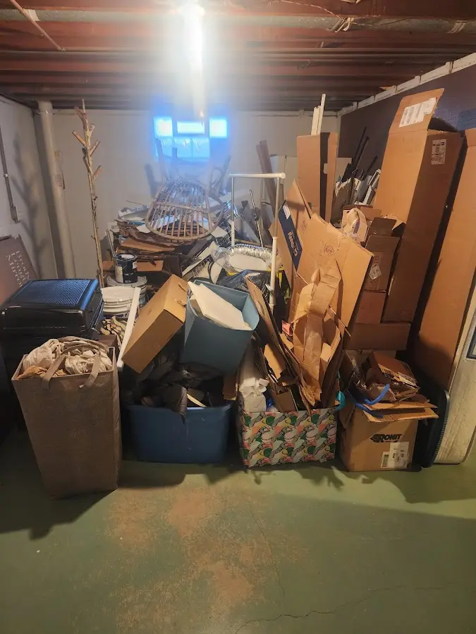 Roll-off dumpster container at job site for 4 Yard Dumpster Rental in Rogersville